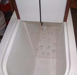Removable center baffle controls sloshing in a heavy beam sea.